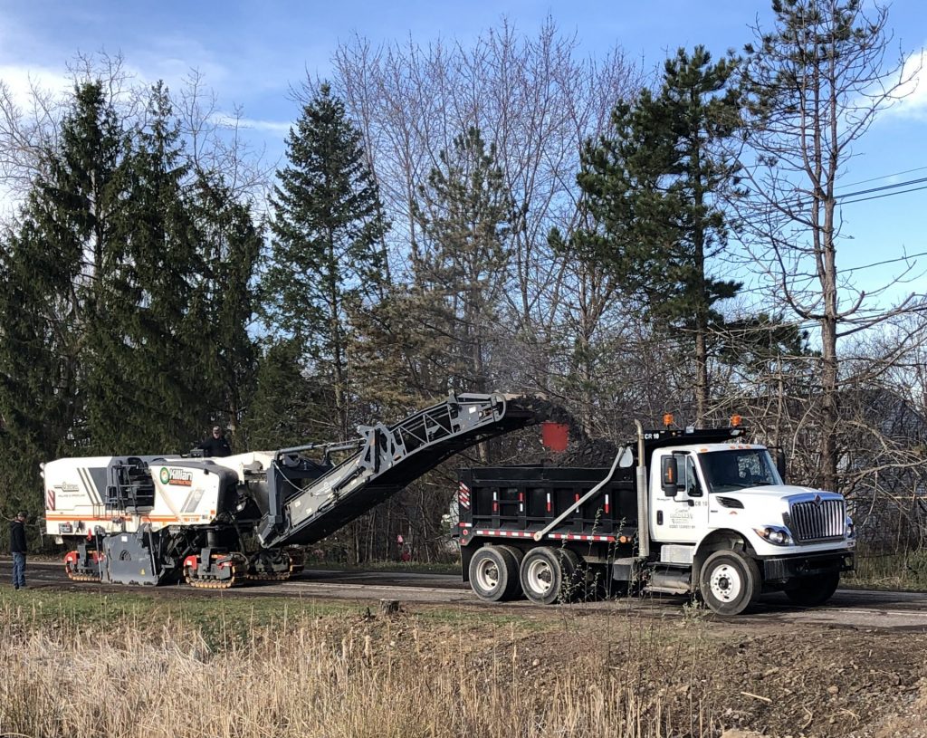 Central Roadways road milling machinery and dump truck.